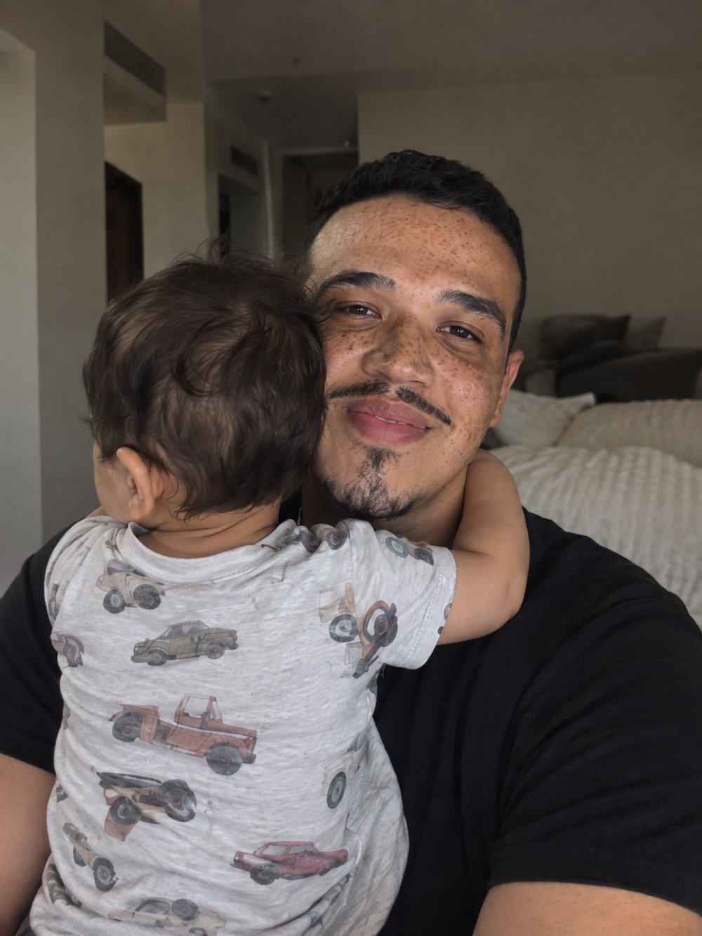 Izz with his son